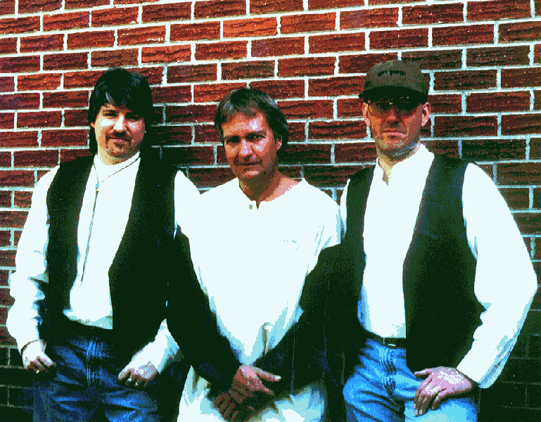 Usual Suspects Photo - posed in front of brick